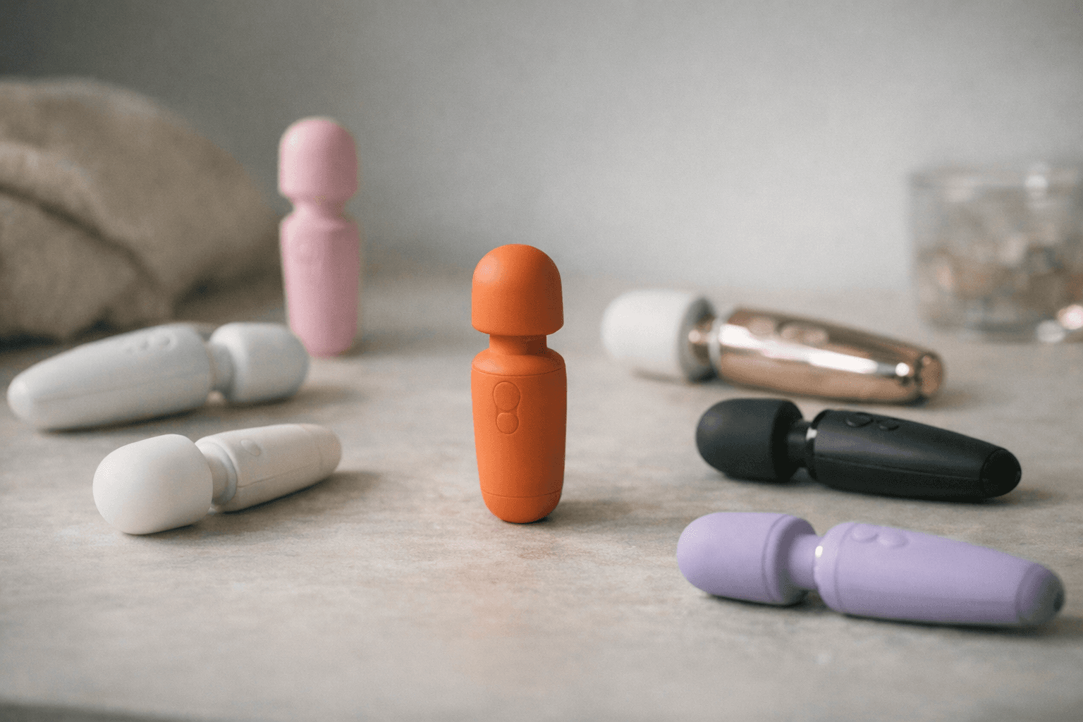 Various mini wand vibrators on display