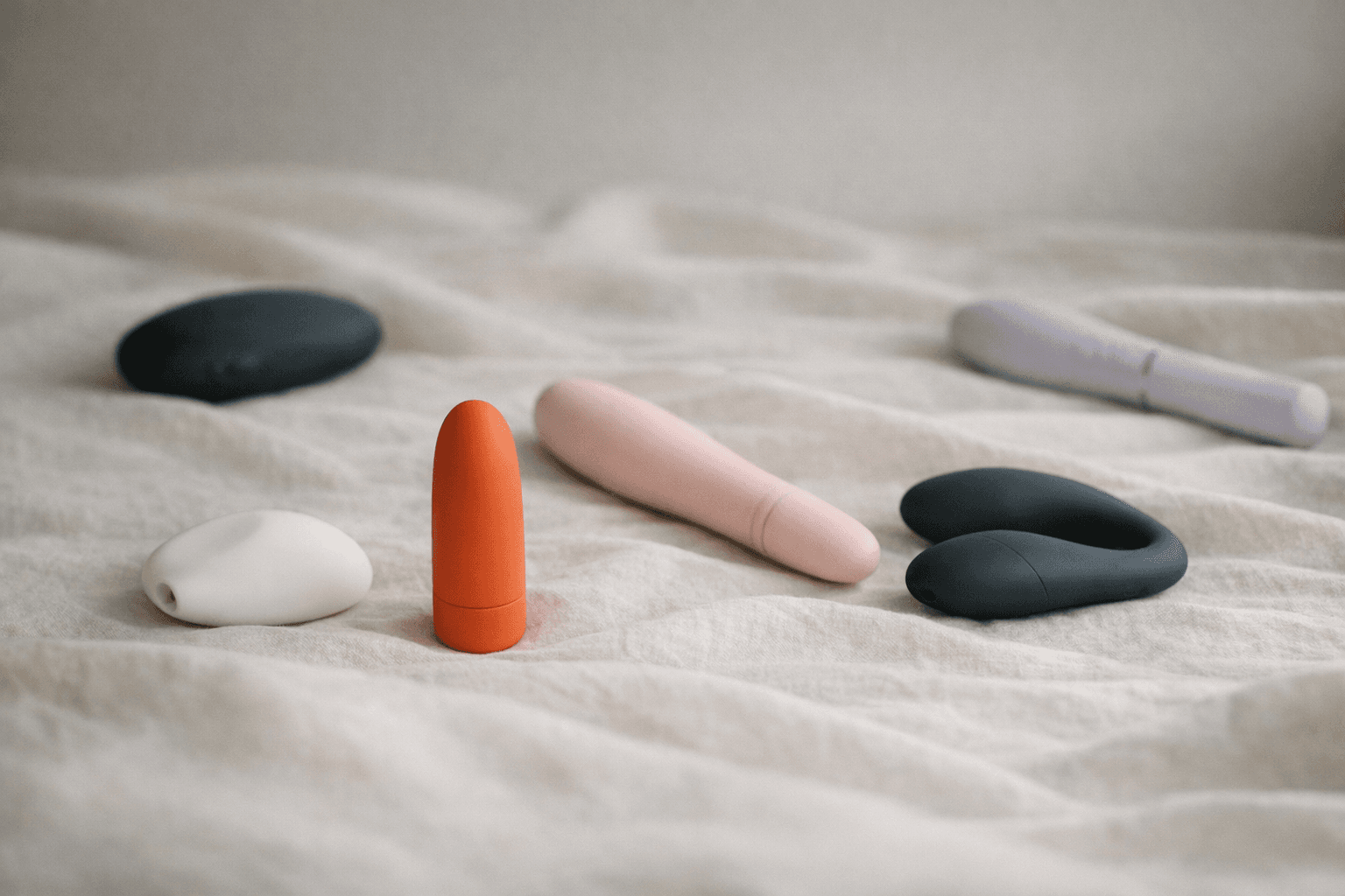 A collection of quiet vibrators on a neutral background.